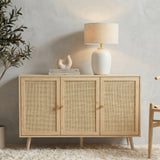 [Oak Effect] front lifestyle of the 3 door Wovena sideboard on oat carpet with paired pine knobs centred on doors