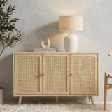 [Oak Effect] front lifestyle of the 3 door Wovena sideboard on oat carpet with paired pine knobs centred on doors