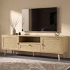 [Oak Effect] Wovena rattan TV unit on patterned rug below wall-mounted TV, ceramic vase and gold ornament on top