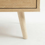 [Oak Effect] Wovena sideboard close up of a tapered round pine leg meeting the mitred oak effect base corner