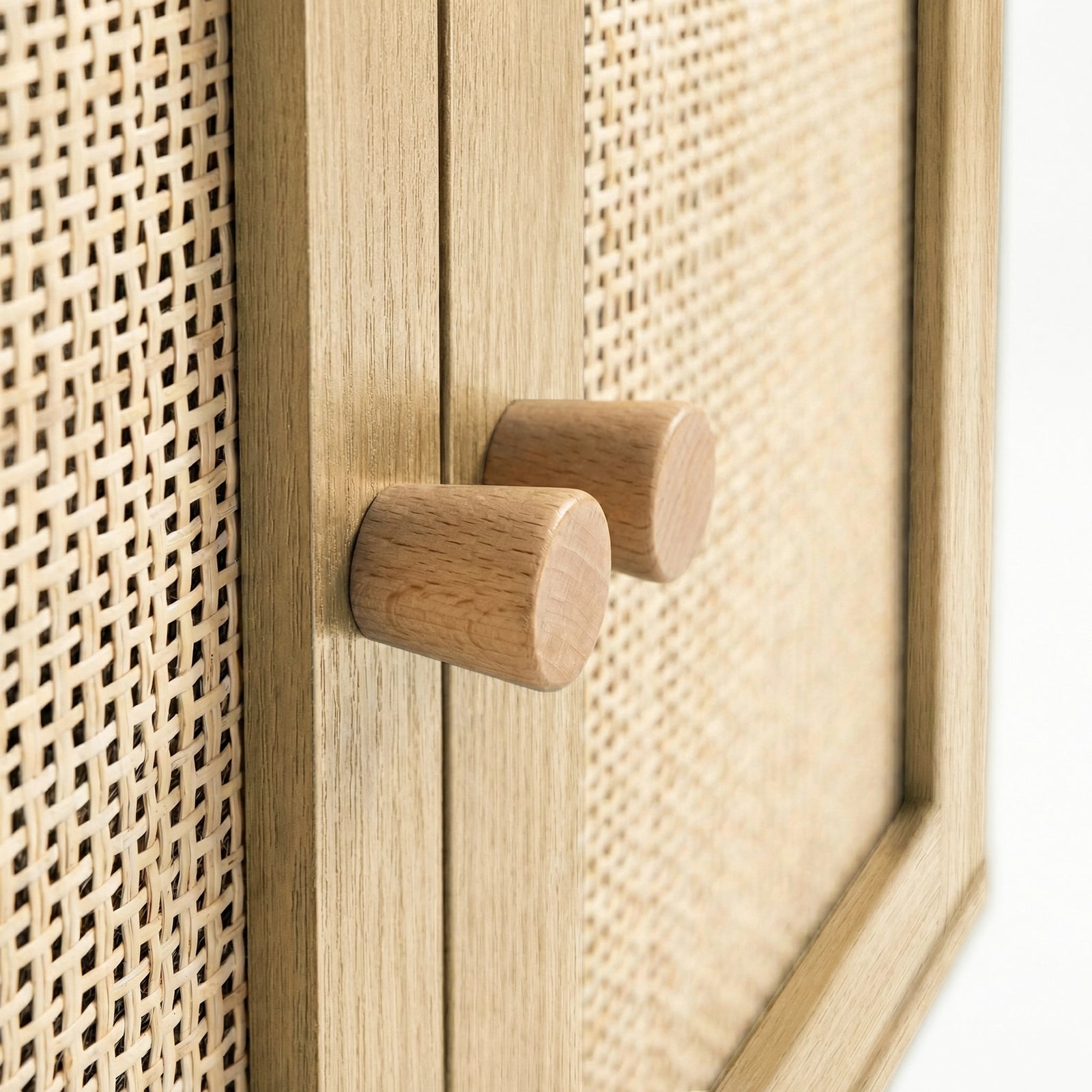 [Oak Effect] paired round pine knob handles on the Wovena rattan sideboard with cane weave filling the frame