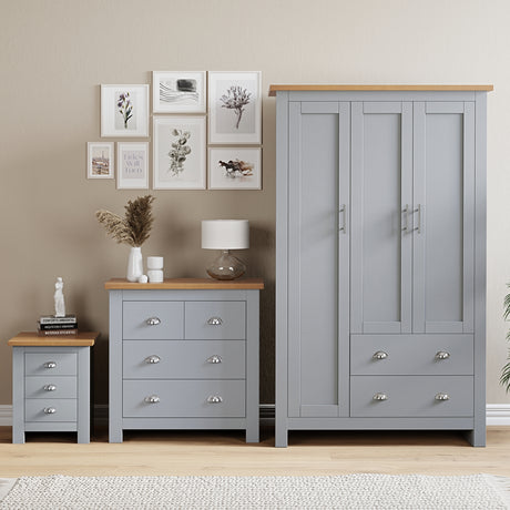 Oak furniture sets with chest of drawers, bedside table, and wardrobes for a stylish bedroom.
