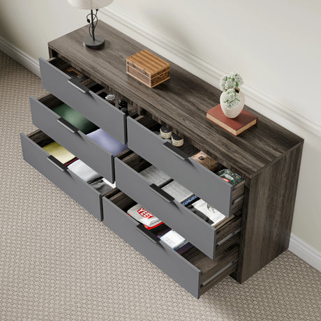 Skova 6 drawer chest of drawers in wooden grey finish with open drawers showing clothes and accessories in a bright room