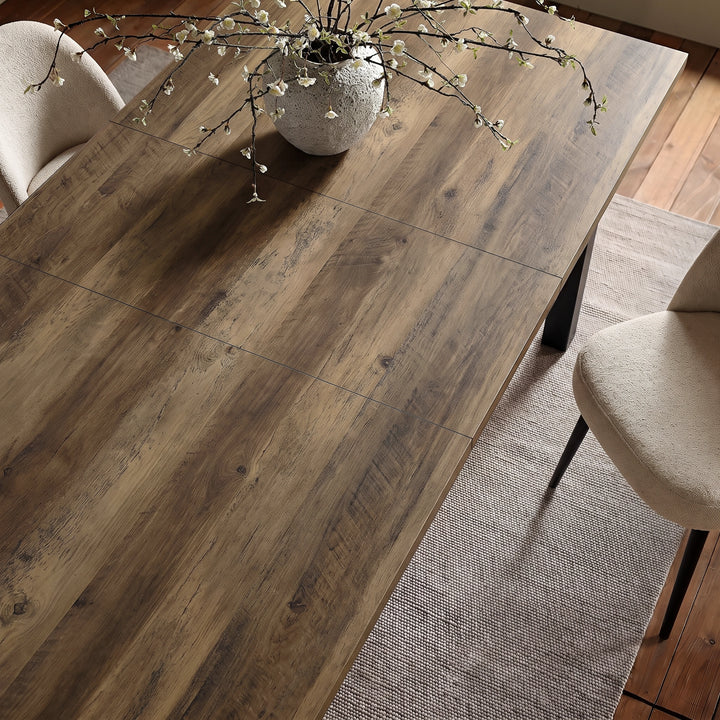 [160 cm | Oak] 200cm Hartley extended dining table top with 40cm centre leaf, Oak grain, cream chairs and blossom vase.
