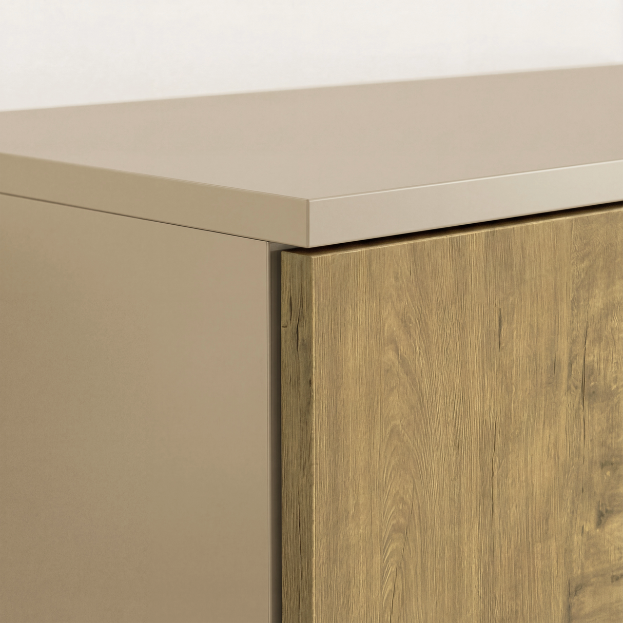 [Oak+Cashmere]  Top corner panel detail of oak and kashmira three door wardrobe, highlighting layered finish and smooth edge profile