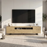 [Oak] Oak Kystra TV stand straight on, cream armchairs each side, AV gear in centre shelf, black iron legs on a rug