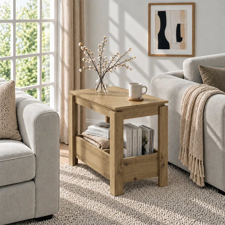 [Oak] Sunlit living room with a narrow side table beside a sofa, a blossom vase on top and books stored below.