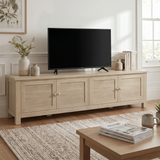 [Oak] Oskara TV unit 180cm side view in lifestyle room with TV, coffee table, warm neutral tones