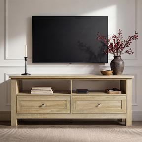 [Oak] Oskara TV unit front view in living room below wall-mounted TV styled with black candlestick, red berry vase, wooden bowl, and media player