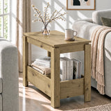 [Oak] Angled side table view with a cup and blossom vase on the closed top, books below and a sofa alongside.