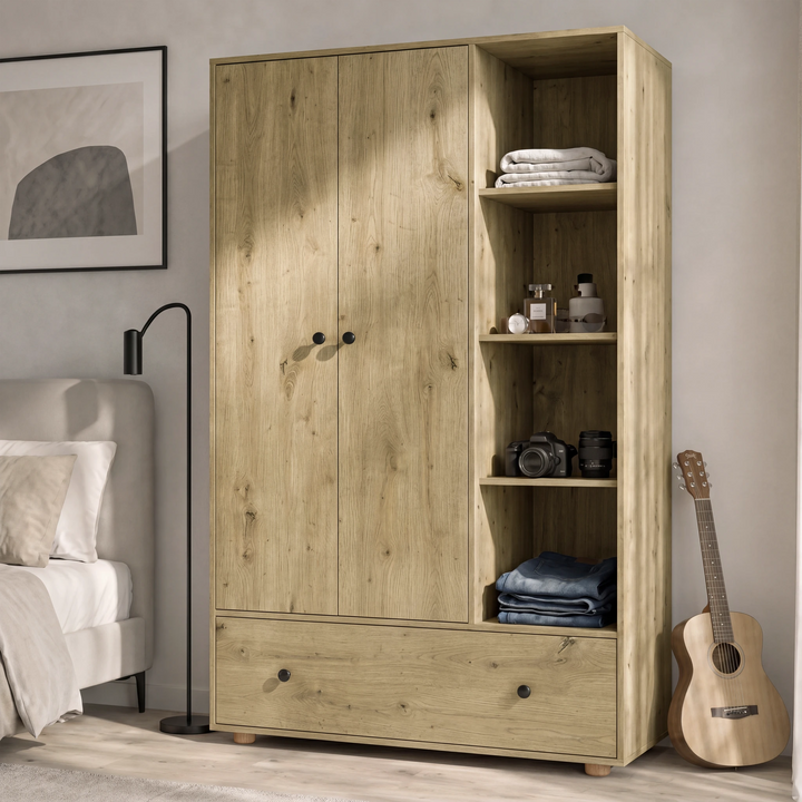[Oak] Selby wardrobe angled view showing double doors, side shelving unit and large bottom drawer in bedroom