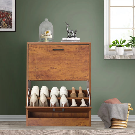 A compact oak 12 pair shoe storage cabinet with a bottom pull-down drawer open and shoes neatly organized inside.