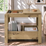 [Oak] Front view of a side table with one top compartment open, a vase on the other panel and books stored underneath.