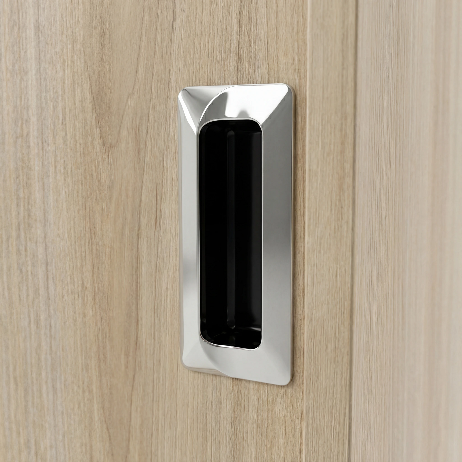 [Oak] Torvek wardrobe close-up of polished metallic recessed rectangular flush handle on oak-effect door panel