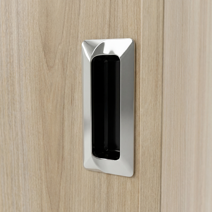 [Oak] Torvek wardrobe close-up of polished metallic recessed rectangular flush handle on oak-effect door panel