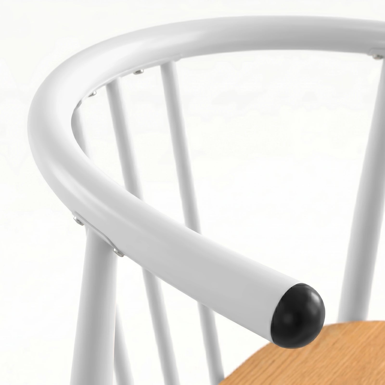 [Oak] Torvi chair curved white metal backrest and armrest detail with black rubber end cap close-up