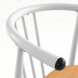[Oak] Torvi chair curved white metal backrest and armrest detail with black rubber end cap close-up