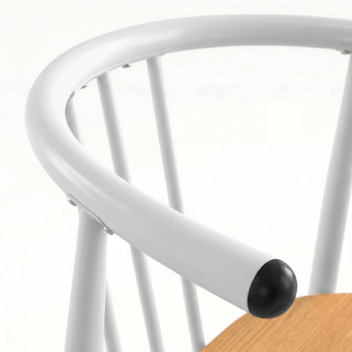 [Oak] Torvi chair curved white metal backrest and armrest detail with black rubber end cap close-up