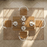 [Oak] Torvi 4 seater dining set bird's-eye view fully laid with plates, cutlery, glasses and napkins on a jute rug over herringbone floor