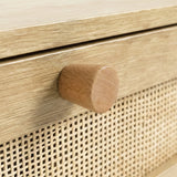 [Oak] Wovena rattan bedside detail of cylindrical pine knob and tight rattan weave pattern
