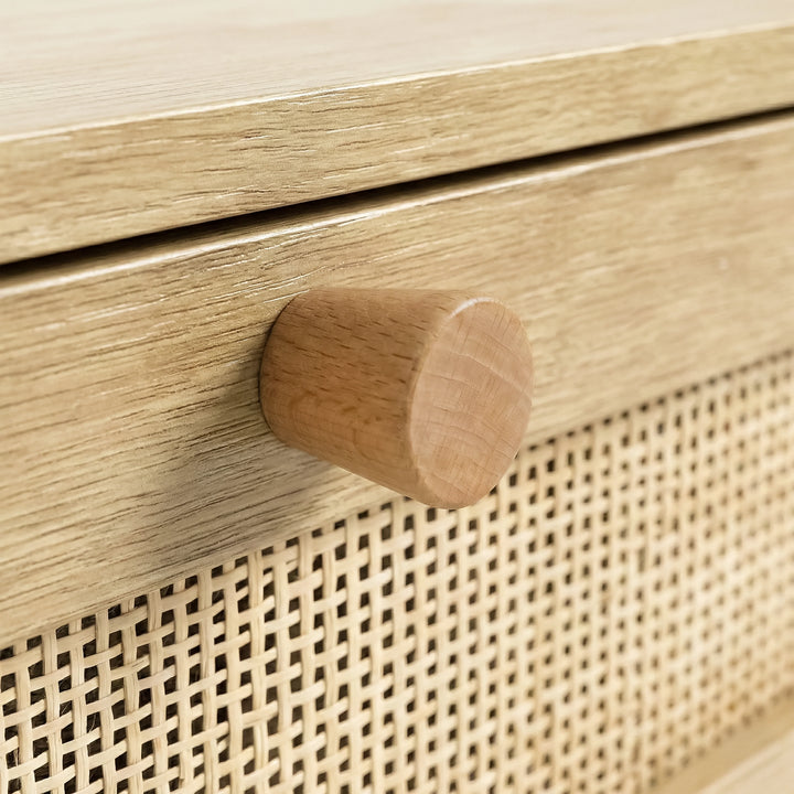 [Oak] Wovena rattan bedside detail of cylindrical pine knob and tight rattan weave pattern