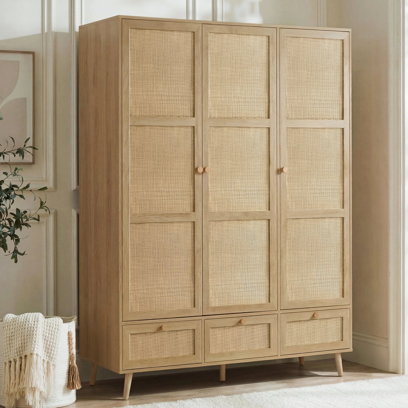 [Oak Effect] Wovena rattan wardrobe three-quarter angle, three rattan-mesh doors closed with small wooden knob handles