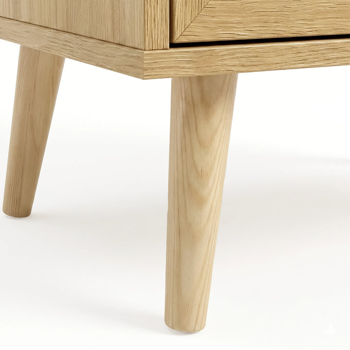 [Oak Effect] Wovena rattan wardrobe lower-corner shot of slim angled wooden legs supporting the oak-effect frame