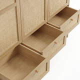 [Oak Effect] Wovena rattan wardrobe base close-up with three rattan-fronted drawers pulled open showing empty interiors