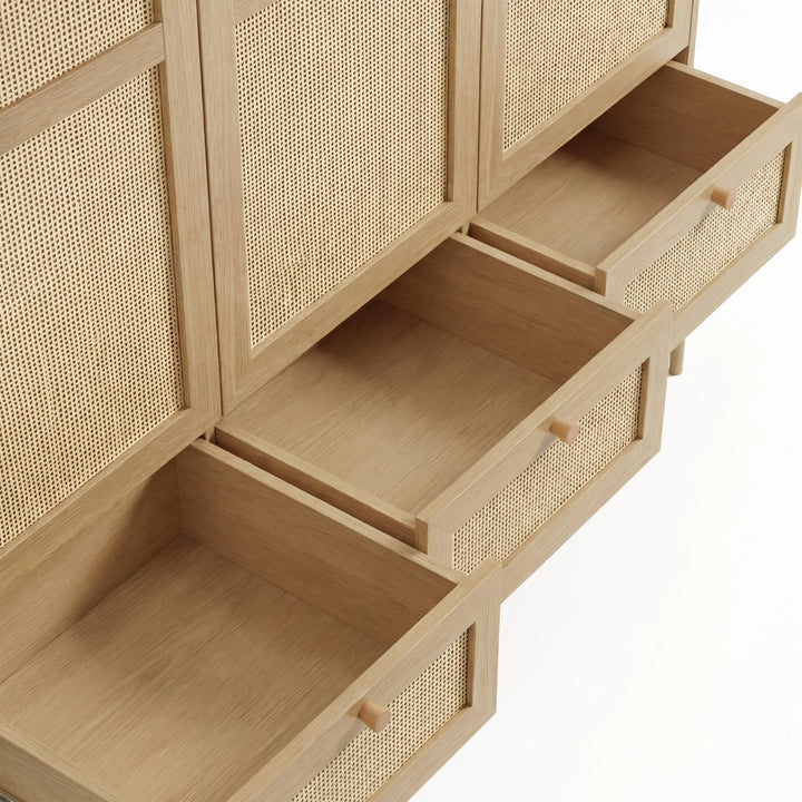 [Oak Effect] Wovena rattan wardrobe base close-up with three rattan-fronted drawers pulled open showing empty interiors