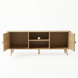 [Oak] Wovena open storage view with both rattan doors swung open, showing internal shelves, cable hole, and oak legs