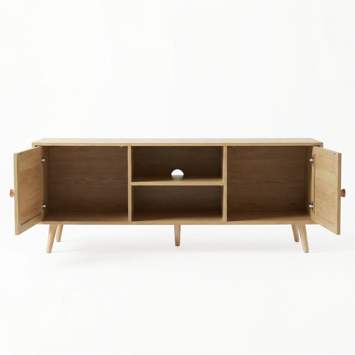 [Oak] Wovena open storage view with both rattan doors swung open, showing internal shelves, cable hole, and oak legs