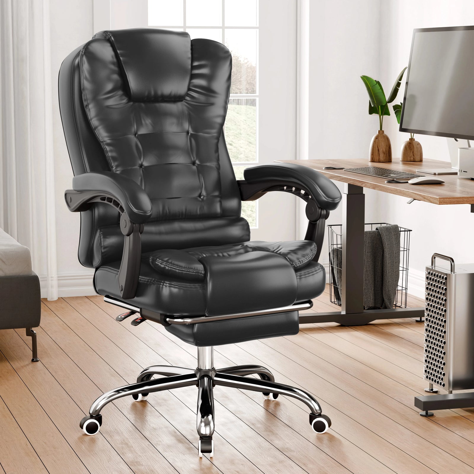 [Black] Black office chair in a home office setting with a desk and computer.