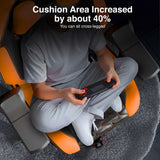 Person sitting on a massage chair with text indicating increased cushion area.