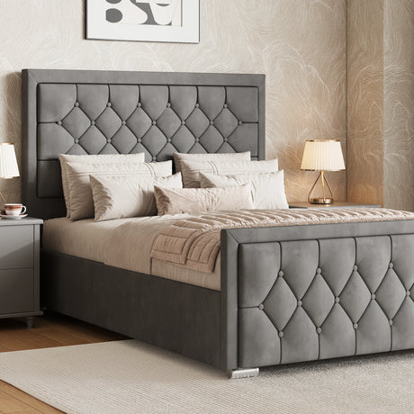 Grey ottoman bed king size with cross-puffed headboard and footboard placed between matching bedside tables