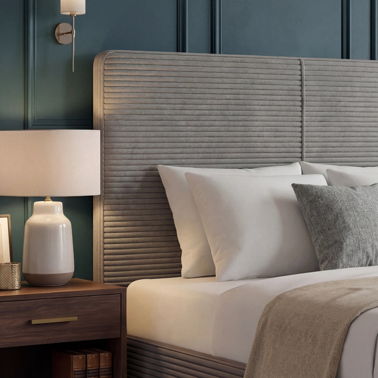 Ottoman king size bed with headboard  in grey ribbed upholstery placed in a modern bedroom