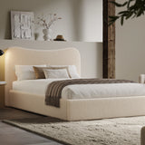 Curved headboard ottoman storage bed in beige boucle fabric with hidden under-bed storage. Modern platform bed frame ideal for stylish bedrooms.