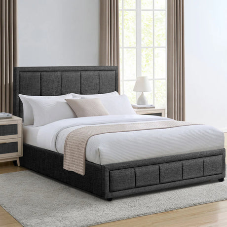 Dark grey ottoman bed frame with a tufted headboard, white bedding, and neutral décor.