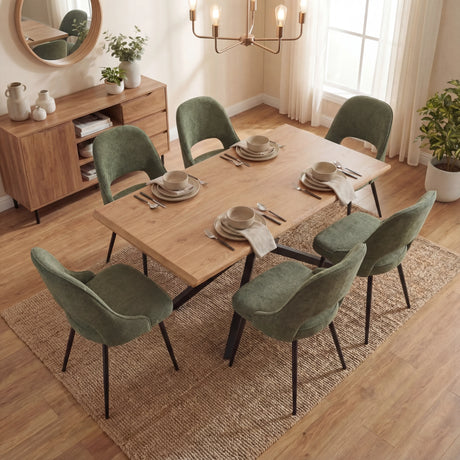 Overhead view of Xylon dining set with 6 green chairs, wooden finish table and simple decor.