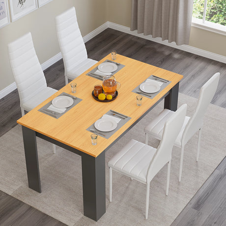 top view of pine wood top 4 seater garden table and chairs with white leather upholstery and 4 tableware on teh top