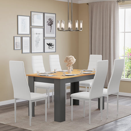 large grey pine wood dining table with 6 chairs paired with white leather seats in bright dining room