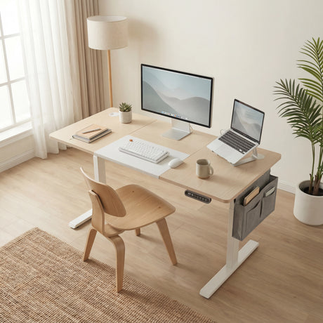 Pine Electric Standing Desk in a bright home office with monitor, laptop stand, and ergonomic chair. Includes side storage and height control panel.