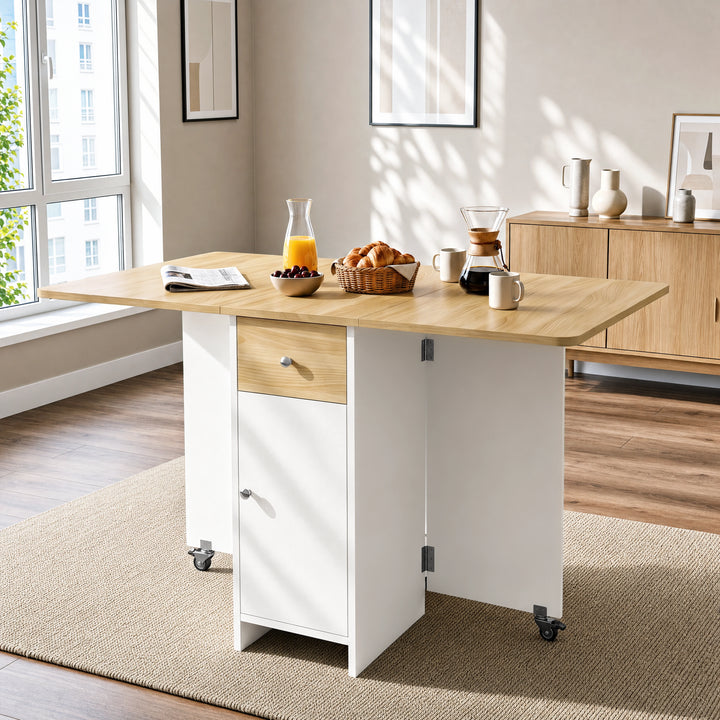 [Pine] Modern folding dining table fully open with drawer, cabinet, caster supports in view and styled with tableware & food.