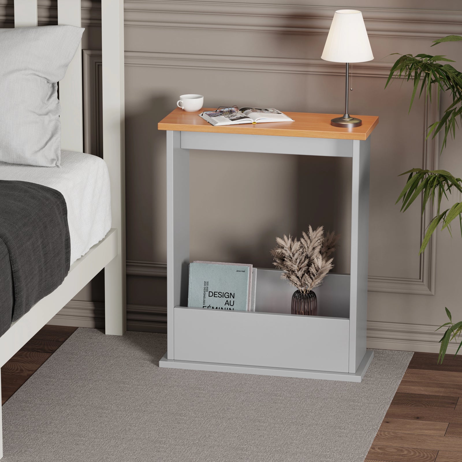 [Pine + Silver Grey] sofa end table in grey with oak top used as nightstand, books and lamp on top in minimal setting