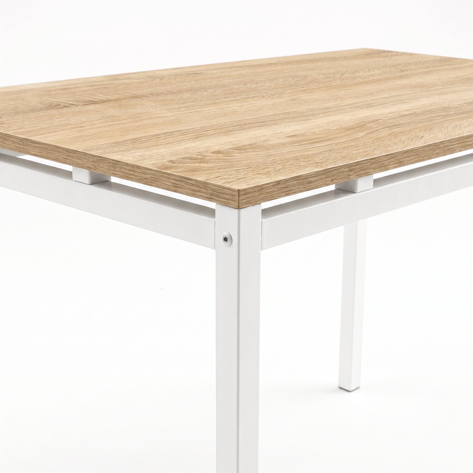 [Pine] Close-up of pine-effect dining tabletop, white powder-coated metal frame, raised supports, square legs and corner bolt