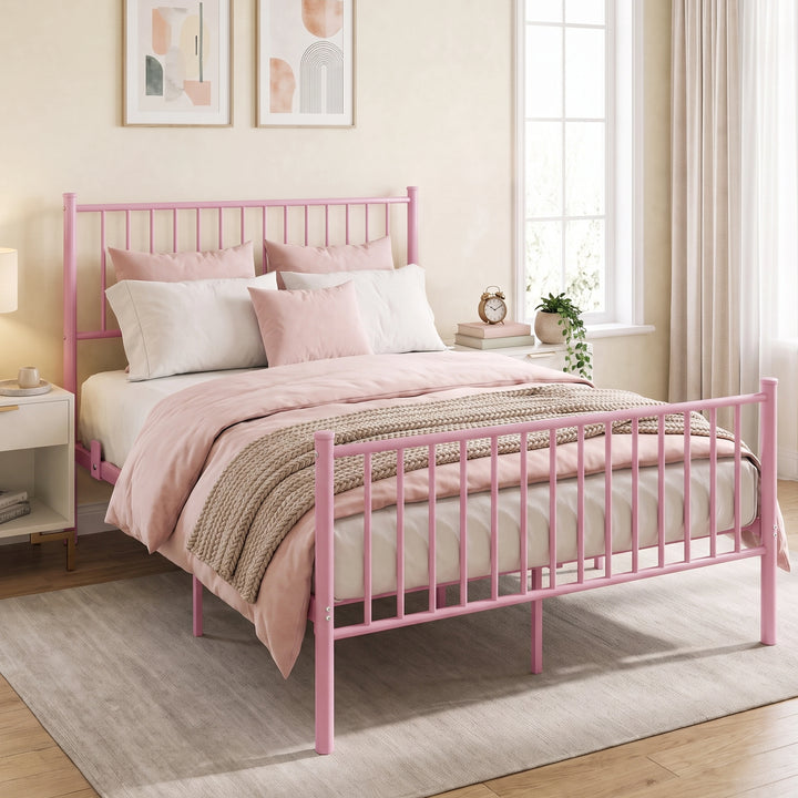 [Pink | Double] Angled view of pink metal bed with pink-white bedding, tall bar headboard, matching footboard and centre legs