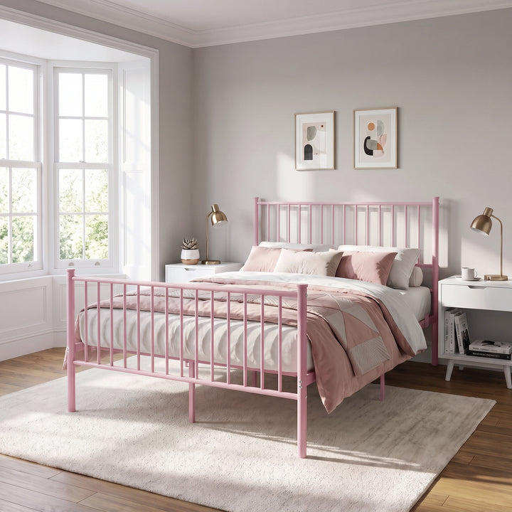 [Pink | Double] Pink metal double bed with pink-white bedding, tall bar headboard, matching footboard and centre support legs