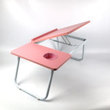 Pink height-adjustable laptop desk, designed for ultimate comfort, perfect for working or reading from bed or the sofa with an easy setup.