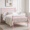 [Pink | Single] Angled view of metal bed with white bedding, beige throw, bar ends, centre leg, nightstand and reading lamp.