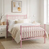 [Pink | Single] Angled view of metal bed with white bedding, beige throw, bar ends, centre leg, nightstand and reading lamp.