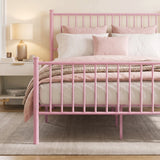 [Pink | Double] Metal bed front close-up view of pink bar footboard, tall headboard, pink-white bedding & centre support legs